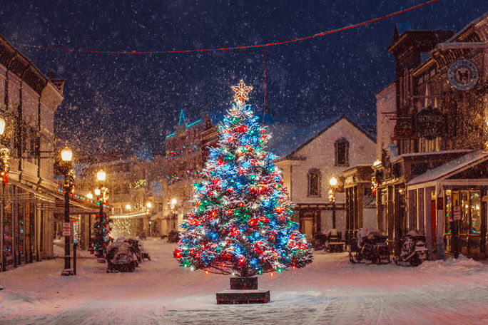 A Christmas tree in the middle of historic Mackinac Island, Michigan in winter. winter destinations, mackinac island, michigan destinations, mackinac island, michigan