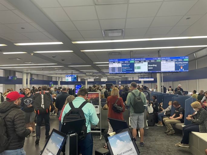 Busy boarding gates at Chicago's O'Hare International Airport. Busy boarding gates at Chicago's O'Hare International Airport.