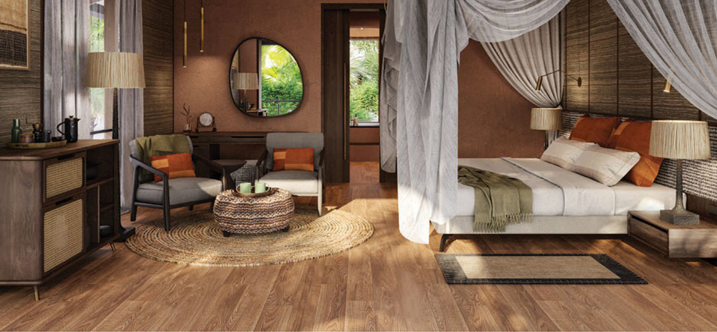 Image: A bedroom and lounge at the Gorilla Forest Lodge in Uganda, now an A&K Sanctuary, which reopened in June 2025 following an extensive renovation. (Photo Credit: Abercrombie & Kent Travel Group)