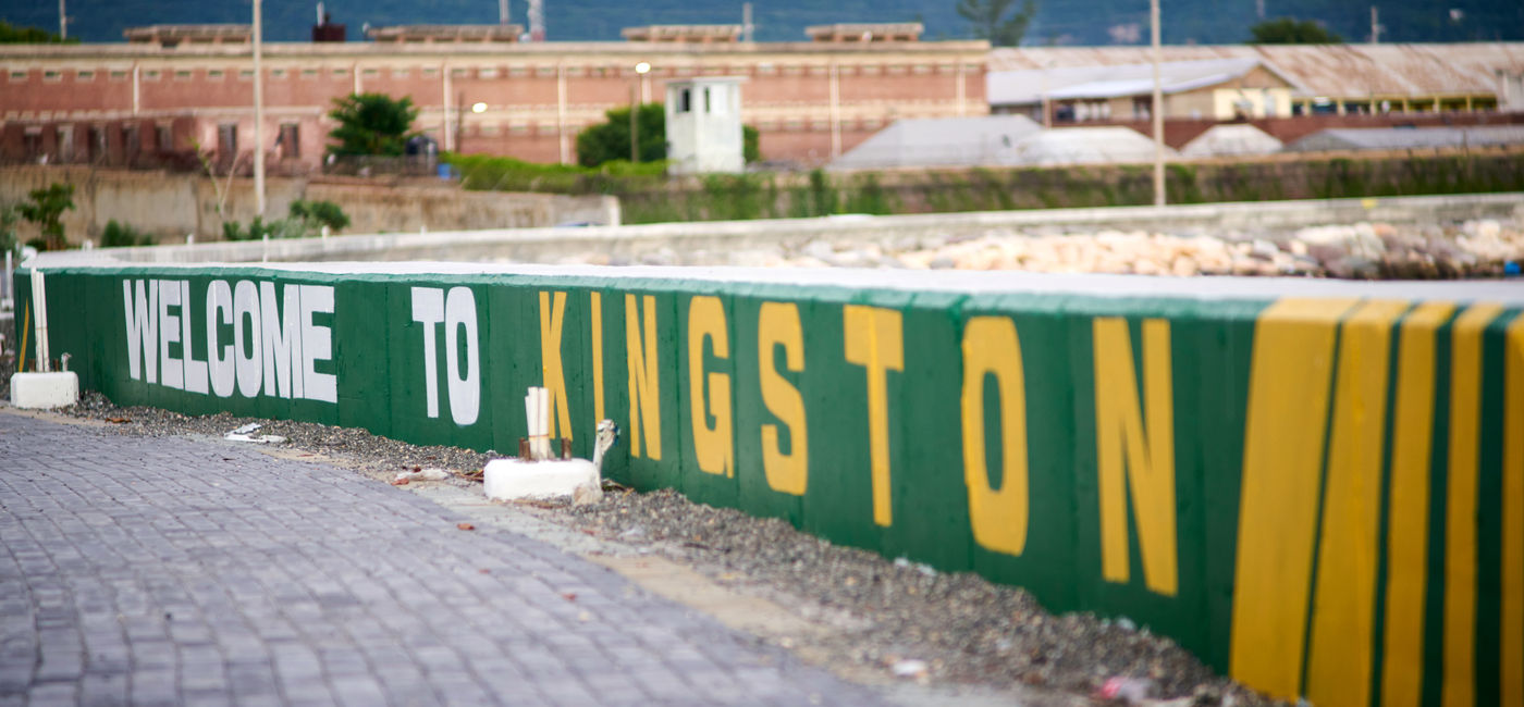 Image: A mural saying "Welcome to Kingston" in Jamaica. (Photo Credit: Kleston / Adobe Stock)