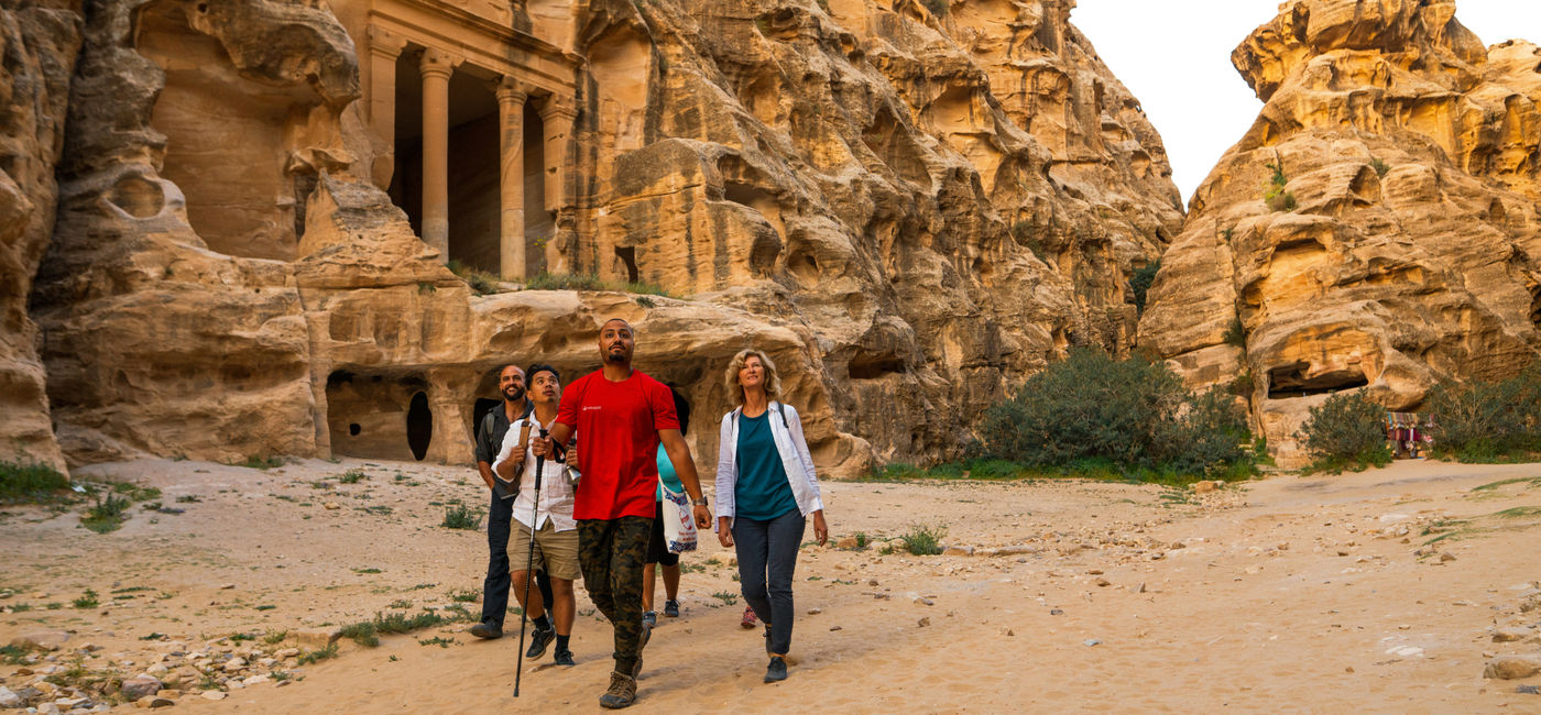 Image: An Intrepid Travel group walking to Petra in Jordan. (Photo Credit: Intrepid Travel)