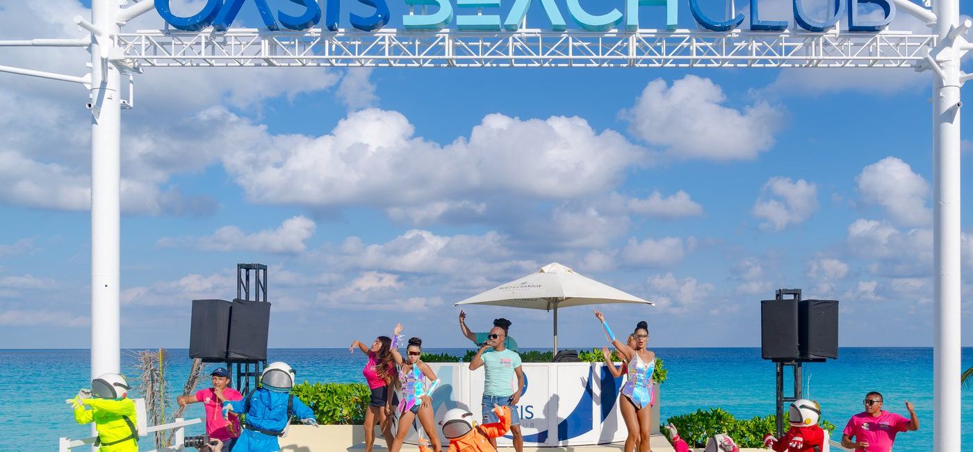 Image: Entertainment at Oasis Beach Club (Photo Credit: Oasis Hotels & Resorts)