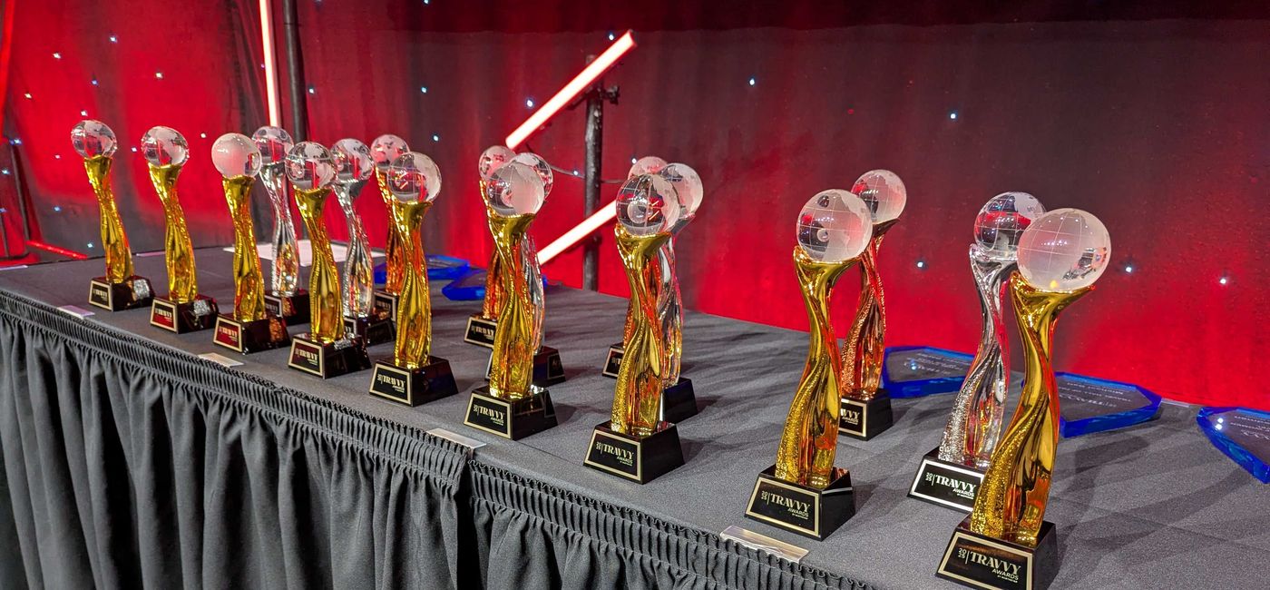 Image: The 2025 Travvy Awards await their winners. (Photo Credit: Eric Bowman)