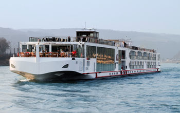Viking longship sailing Europe's Rhine river.
