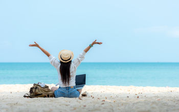 Female working on the beach, laptop, work, travel,