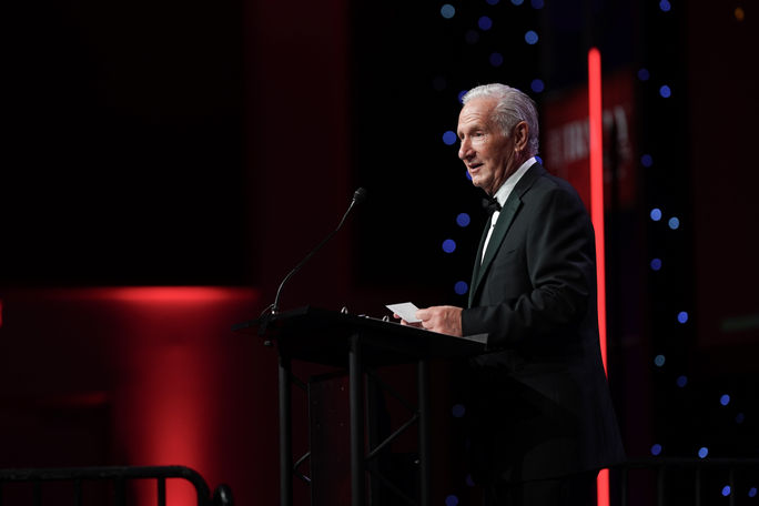 Michael Batt speaks on stage at the 2025 Travvy Awards Michael Batt speaks on stage at the 2025 Travvy Awards