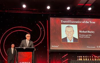 Michael Bayley accepts Travel Executive of the Year award at 2025 Travvy ceremony.