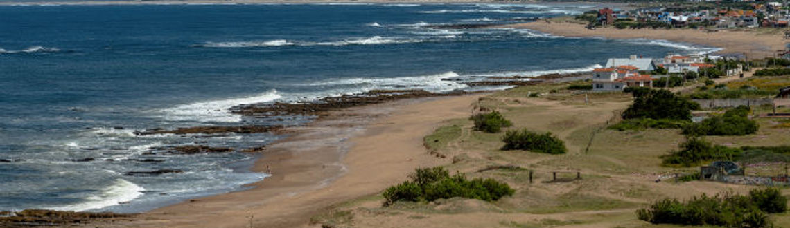 The beaches of Uruguay invite visitors to rest and enjoy them with their families. (Photo via MarcosMartinezSanchez/iStock/Getty Images Plus).