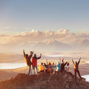 Large group of friends in mountains area.