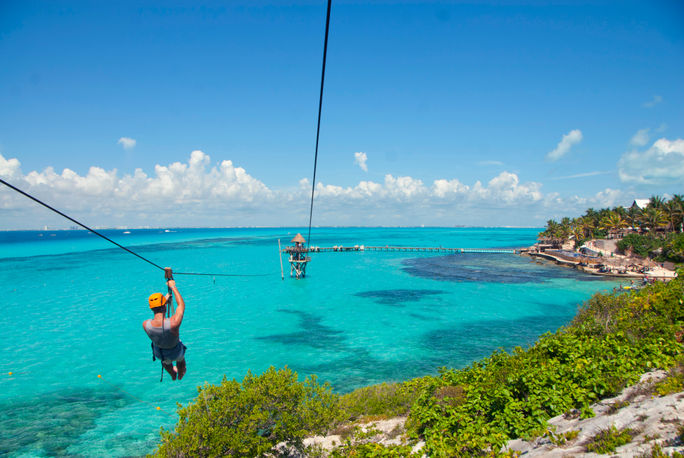 Ziplining on Isla Mujeres, Quintana Roo, Mexico. Ziplining on Isla Mujeres, Quintana Roo, Mexico.